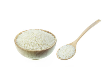 Close up Thai jasmine rice in wooden bowl isolated on white