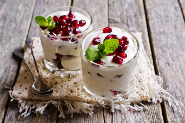 Yoghurt with pomegranate seeds