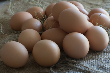 Still Life- laying eggs on burlap.