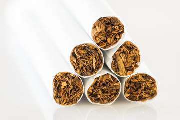 close up set of cigarettes on white background