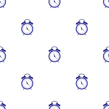 Seamless vector pattern. Symmetrical background with blue alarm clocks on the white background.