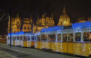 Christmas Tram in front of Parliament Building, Budapest, Hungary