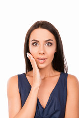 Fototapeta premium Portrait of surprised girl on white background