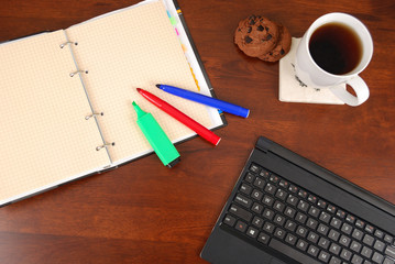 Modern workplace with a cup of tea