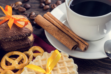 Biscuits and coffee on table