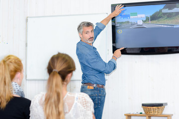 Driving instructor explaing road theory
