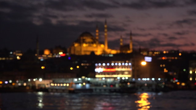 Video shows the famous Islamic landmark Suleymaniye Mosque in Istanbul Turkey. Intentionally defocused while recording. Shot just after sunset to achieve a vibrant motion and colors.