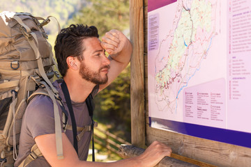  hiker studying the map