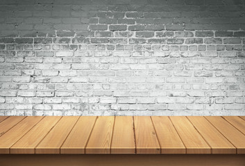 Wood table with White brick wall background
