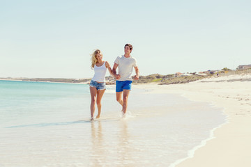 Romantic young couple on the beach