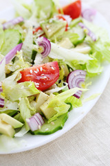 healthy vegetables salad on white plate