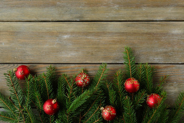 Fototapeta na wymiar christmas rustic background with red balls