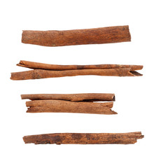 Close up of Cinnamon stick (Cinnamomum verum) isolated on white