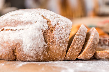 Loaf of bread with flour in a bakery