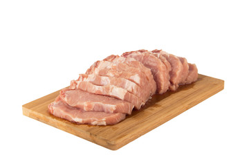 Raw piece of meat on a wooden board on a white background