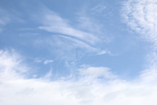 Fantastic soft white clouds against blue sky background. © modify260