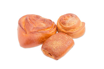 Three different sweet buns on a light background