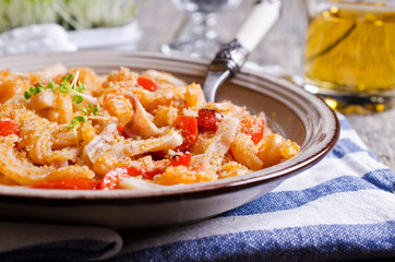Pasta with squid and vegetables