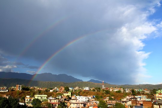 Double rainbow in the sky after rain. Hetauda, Nepal