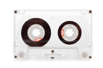 Old compact audio cassette, macro shot on white background, empty