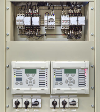 Electrical control panel with electronic devices in modern electrical substation