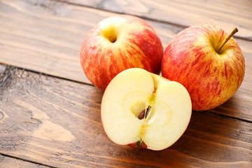 Apple on wooden table.