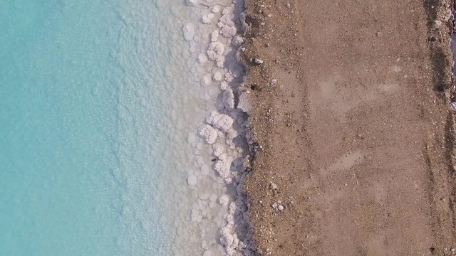 Aerial footage of The Dead sea Salt and mineral deposits