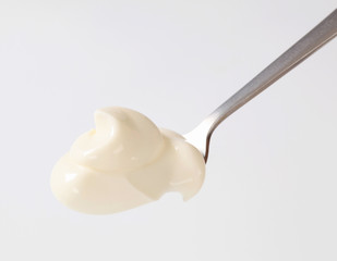 Fresh double cream on a spoon
