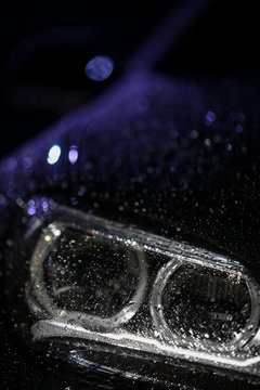 Car headlight with rain drops