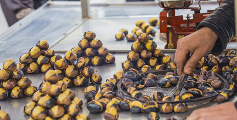 Fototapeta na wymiar Delicious roasted chestnuts at Istanbul street.