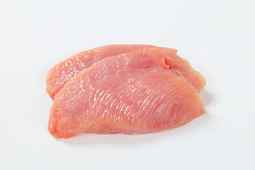 Raw turkey breast steaks