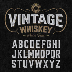 Vintage whiskey label font with sample design. Ideal for any design in vintage style. 