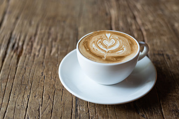 hot coffee on wooden table