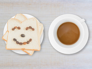 cup of coffee on wooden table