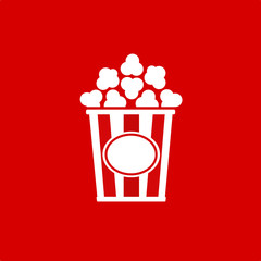 Popcorn vector illustration on red background.