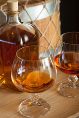 Glasses and a bottle of cognac