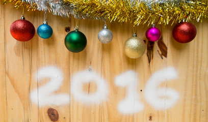 Happy New Year 2016 as a wooden background.
