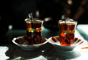 Turkish tea is served in a cafe with Bosphorus view in Istanbul, Turkey