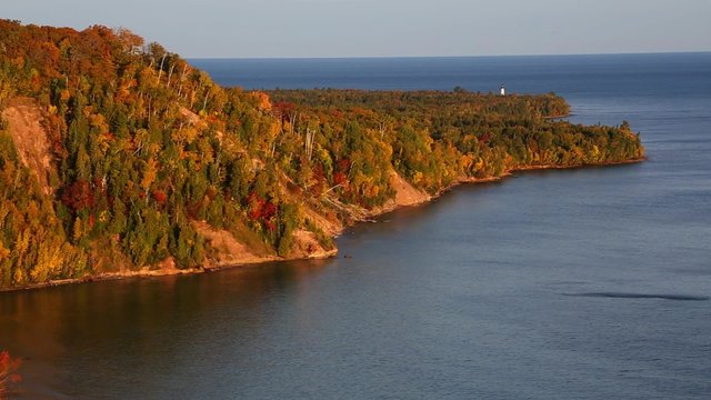 Ausable Point Sunrise in Autumn - Soft morning light illuminates Ausable Point and Lake Superior in the Upper Peninsula of Michigan.