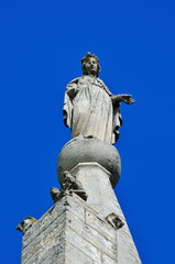Fototapeta na wymiar Cathedral in Bonnieux, France. Sculpture of the Virgin Mary