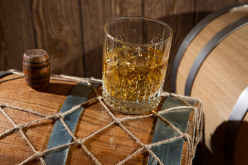 Glass of whiskey with ice