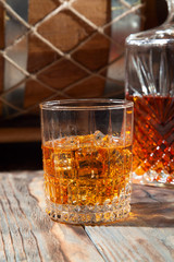 Glass of whiskey with ice