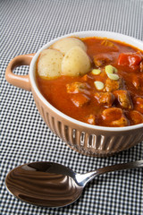 casserole with meat stew and tomato sauce