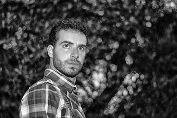 Man Relaxing in Warm Sunlight among Trees