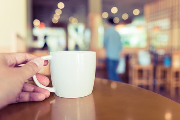 white coffee cup in coffee shop