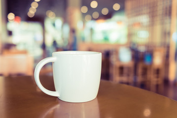 white coffee cup in coffee shop