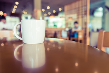 white coffee cup in coffee shop