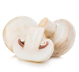 Fototapeta premium Champignon mushrooms close-up isolated on a white background.