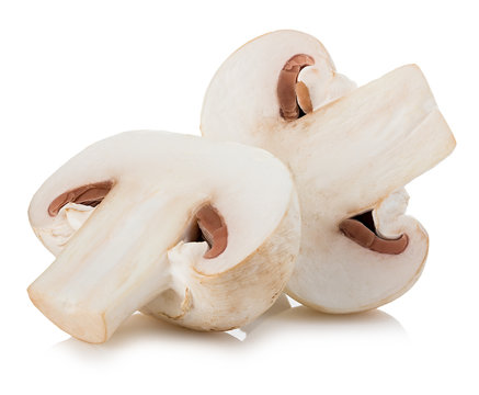 Champignon mushrooms close-up isolated on a white background.