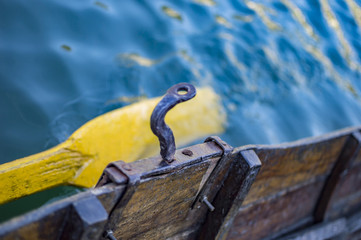 Boat and its oar in water